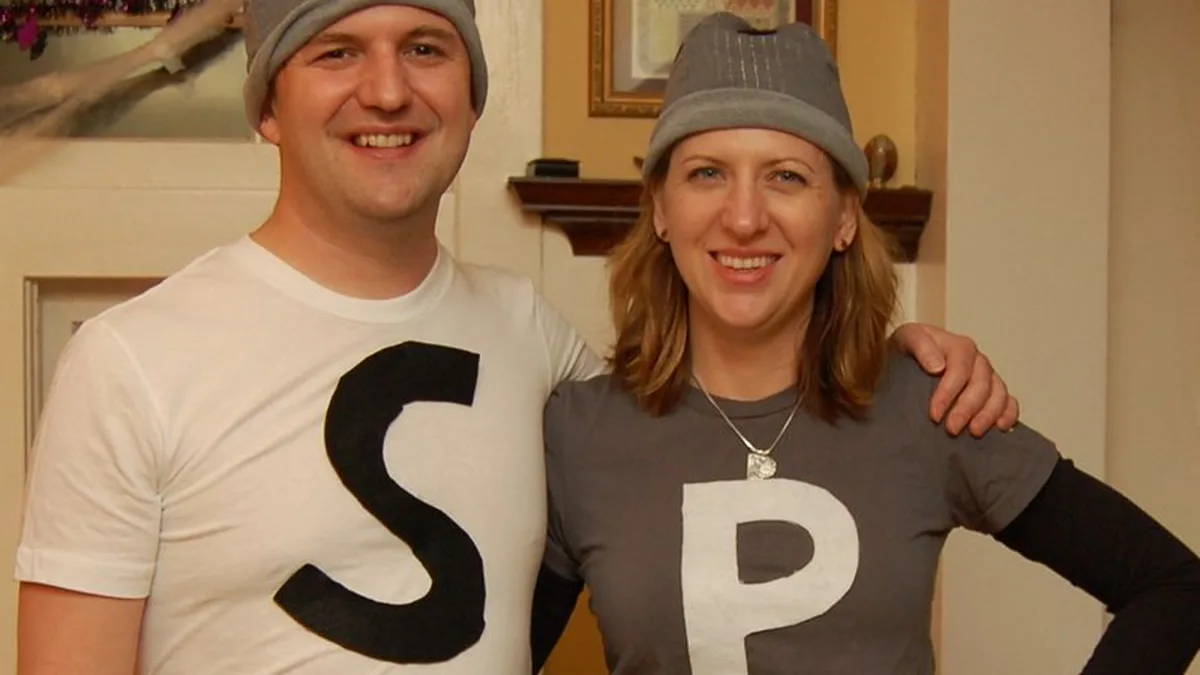 Couple wearing an easy salt and pepper costume with felt S and P letters on T-shirts and gray shaker hats